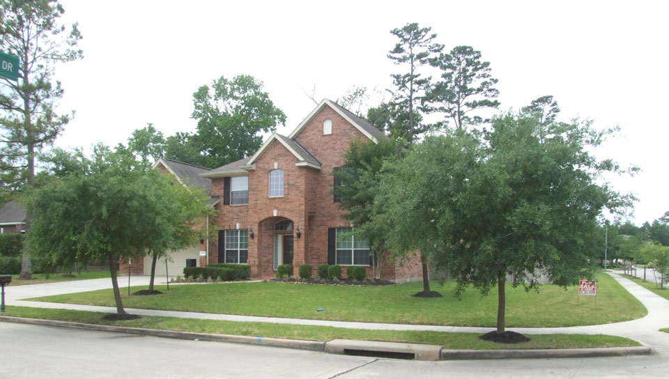 Front of home for sale in Oakhurst at Kingwood
